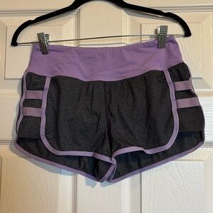 Lululemon women’s gray and purple lined athletic shorts size 2